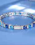 Bracelet de tennis en moissanite et pierres bleu océan